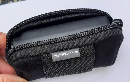 Neoprene case with the Medtronic insulin pump secured inside.